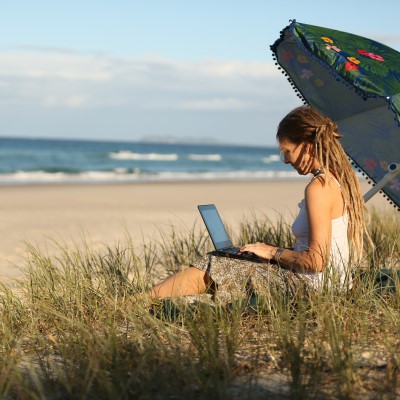 digital nomad on beach